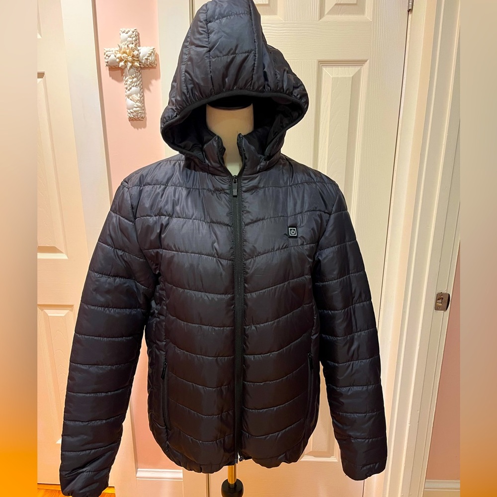 Womens heated jacket. Inside shown as well as pocket charging.